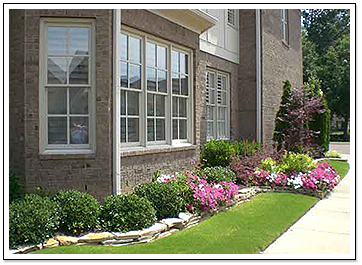Exterior of Home with Flowerbed
